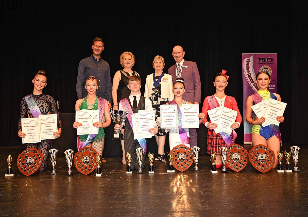 Winners photo with adjudicator Graeme Pickering, TDCI President Helen Ford, TDCI Vice President Lilian Aubrey, and TDCI General Secretary Chris Booth