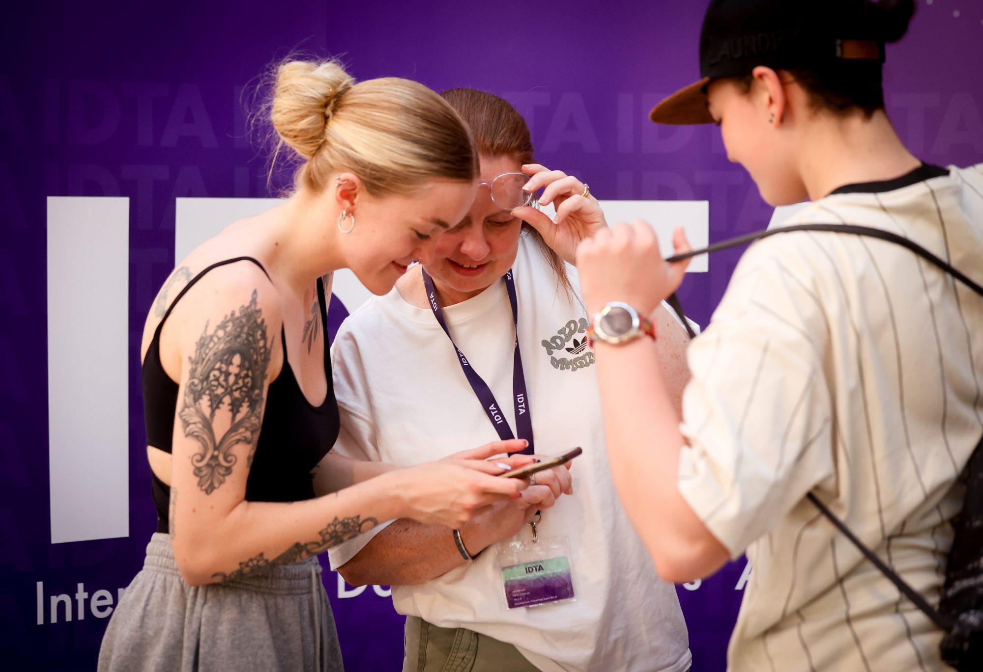 young adults checking phone
